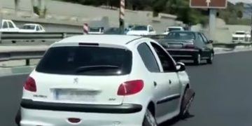 ببینید | اقدام عجیب راننده پژو ۲۰۶ در خیابان‌های تهران؛ تایرها راشیتیسم گرفتند!